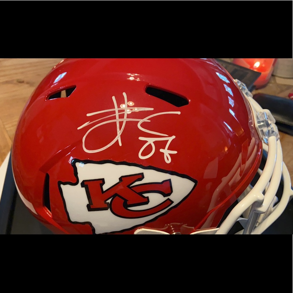 Travis Kelce signed (Beckett) full size helmet.